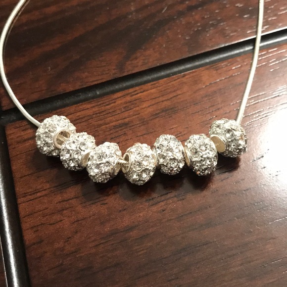 7 Charm Necklace - Picture 2 of 2